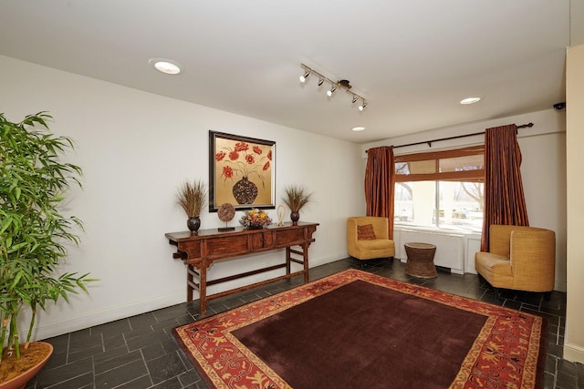 sitting room featuring recessed lighting and baseboards