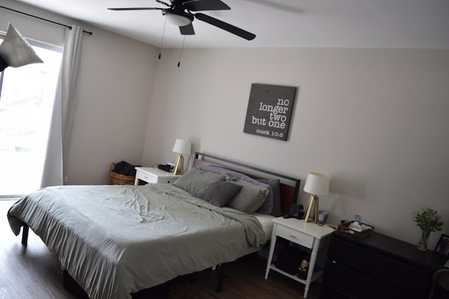 bedroom featuring ceiling fan and wood finished floors