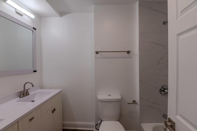 bathroom featuring toilet, shower / bath combination, and vanity