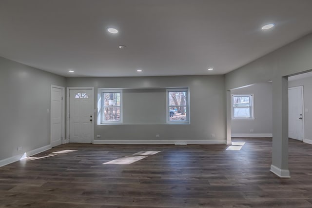 entryway with baseboards, dark wood-style flooring, and recessed lighting