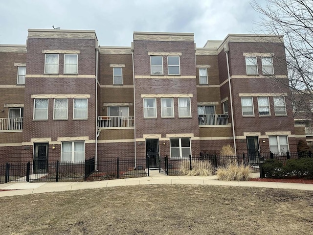 view of property featuring a fenced front yard