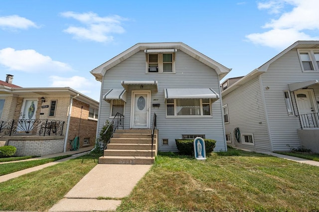 view of front of house with a front yard