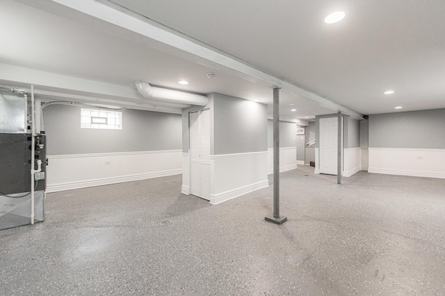 basement featuring recessed lighting