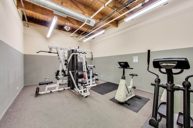 workout area with visible vents and baseboards