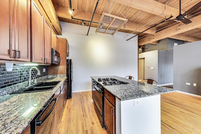 kitchen with beam ceiling, wooden ceiling, a sink, and black appliances