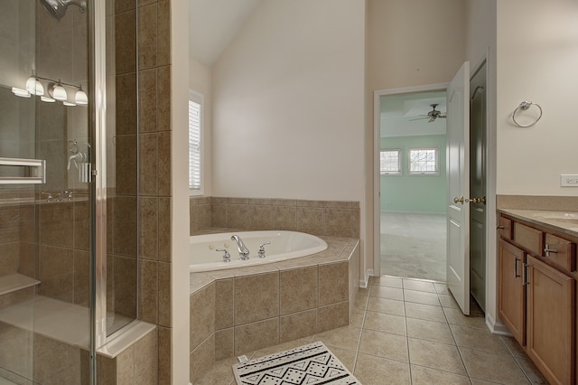 26403 W Red Apple Rd, Plainfield, IL 60585 - full bathroom with a stall shower, tile patterned flooring, a bath, vanity, and lofted ceiling