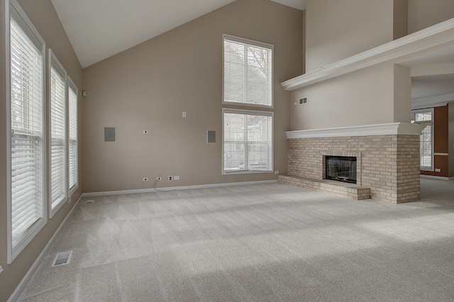 26403 W Red Apple Rd, Plainfield, IL 60585 - unfurnished living room featuring high vaulted ceiling, carpet, baseboards, and a brick fireplace
