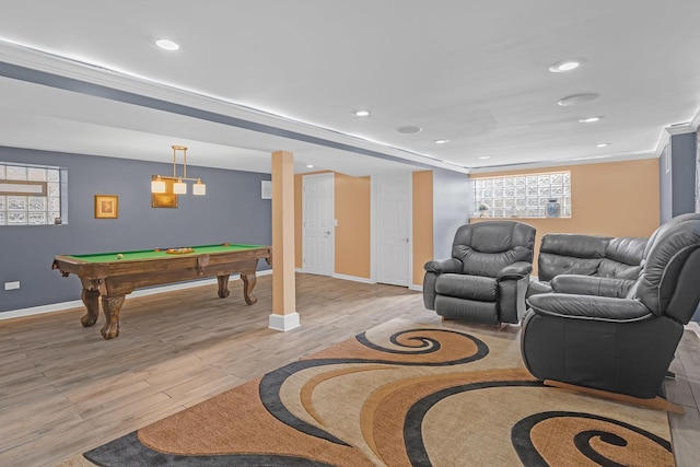 interior space featuring baseboards, crown molding, light wood-type flooring, and recessed lighting