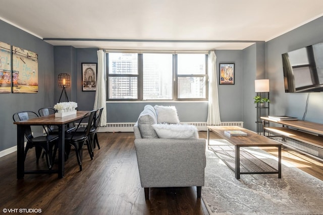 living area featuring dark wood-style floors and baseboards