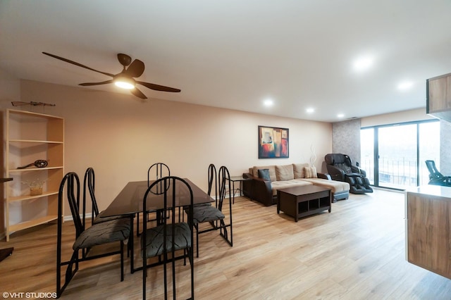 dining area with recessed lighting, a ceiling fan, and light wood-style floors