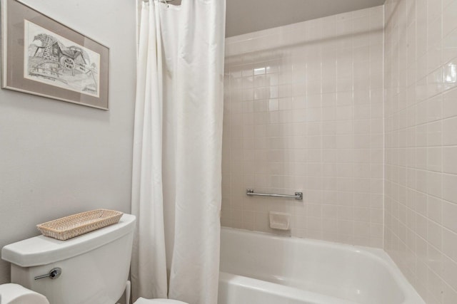 full bathroom featuring toilet and shower / tub combo