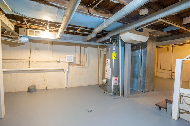 unfinished below grade area with water heater and visible vents