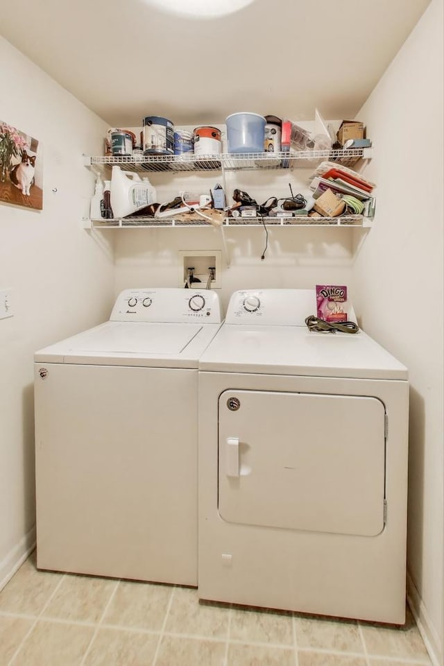 laundry room featuring laundry area and washing machine and clothes dryer