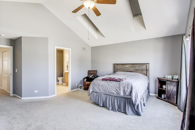 carpeted bedroom with ensuite bath, high vaulted ceiling, baseboards, and visible vents