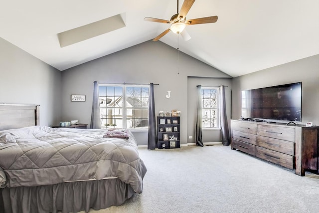 carpeted bedroom with a ceiling fan, lofted ceiling with beams, and baseboards