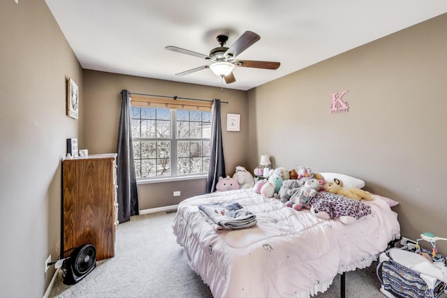 bedroom with ceiling fan, carpet flooring, visible vents, and baseboards