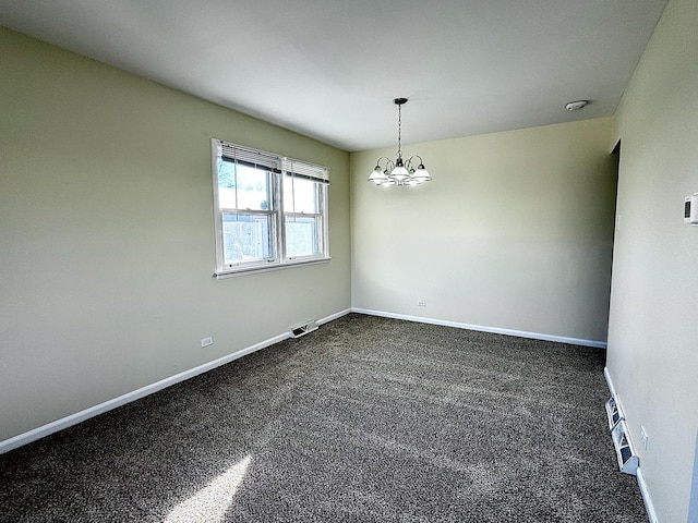 unfurnished room with baseboards, dark carpet, visible vents, and an inviting chandelier