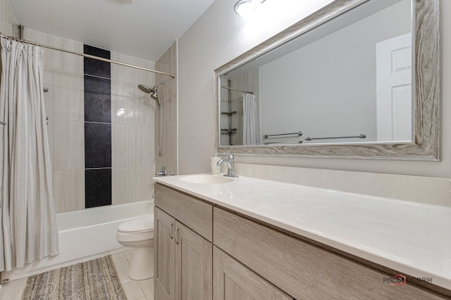 bathroom featuring shower / bath combo, vanity, toilet, and tile patterned floors