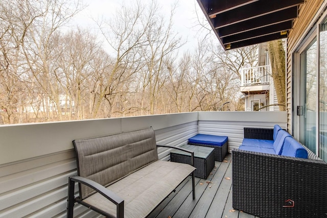 deck with an outdoor hangout area