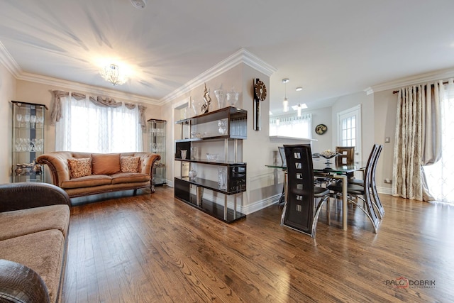 living area featuring dark wood-style floors, a wealth of natural light, crown molding, and baseboards