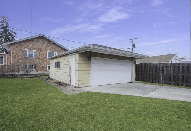 view of property exterior with a garage, a yard, and fence