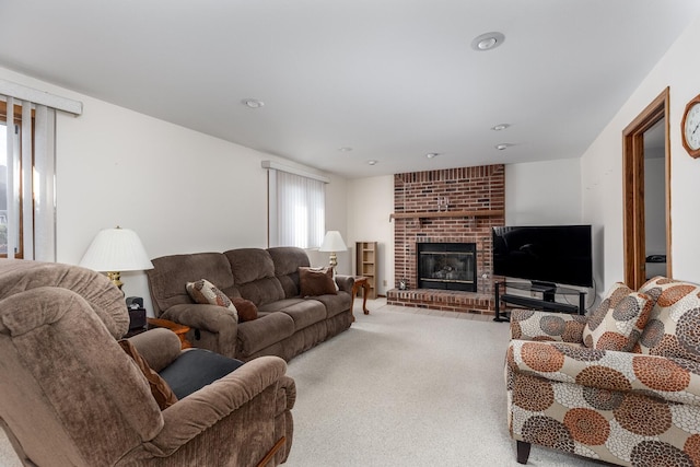 living room featuring light colored carpet and a fireplace