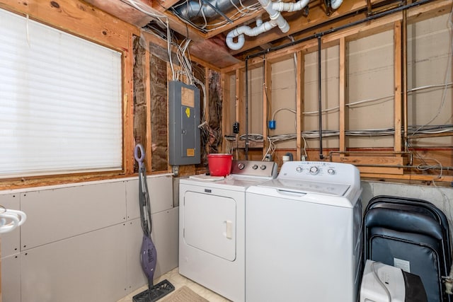 washroom featuring independent washer and dryer and electric panel