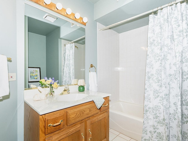 full bathroom with tile patterned flooring, shower / tub combo, and vanity