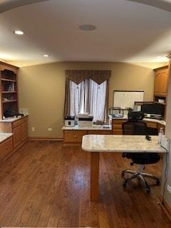 office area with dark wood-style floors, recessed lighting, and baseboards