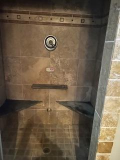 details featuring a tile shower