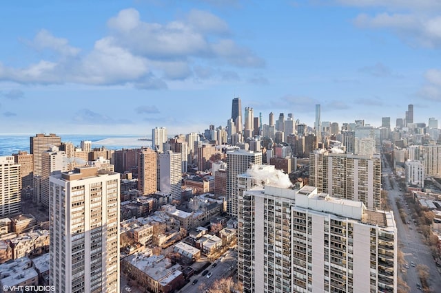 property's view of city with a water view