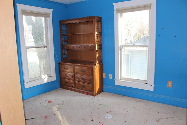 unfurnished bedroom featuring baseboards