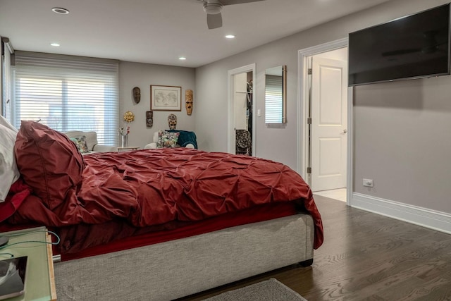 bedroom with recessed lighting, wood finished floors, baseboards, and ceiling fan