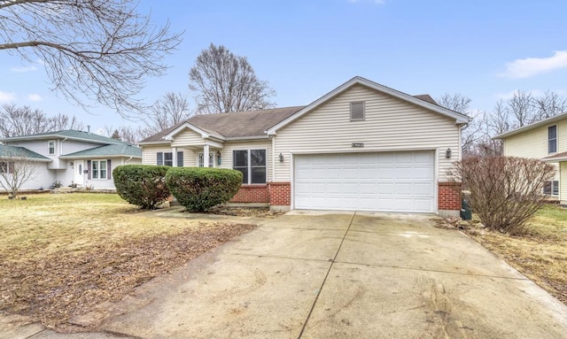 single story home featuring a garage, concrete driveway, brick siding, and a front lawn