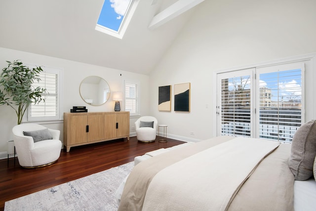 bedroom with a skylight, access to outside, multiple windows, and dark wood-style flooring