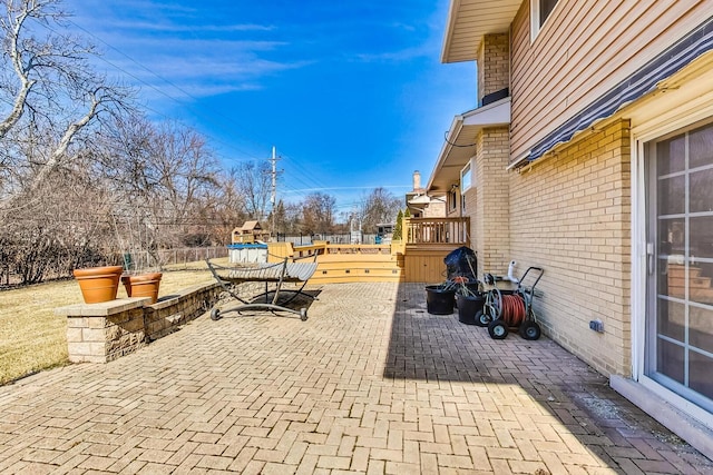 view of patio featuring a deck