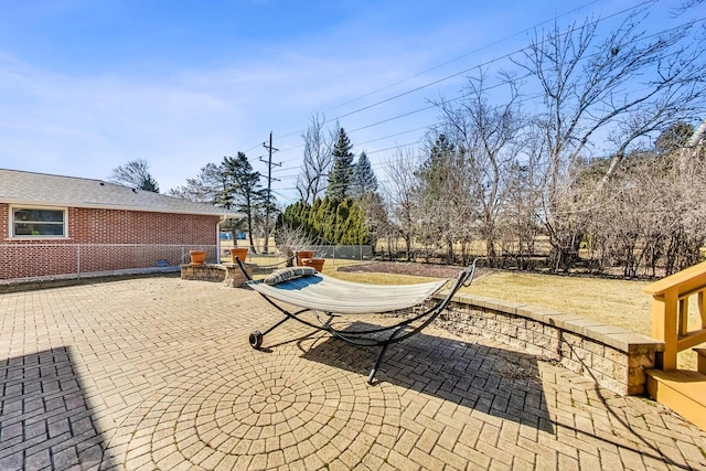 view of patio with fence