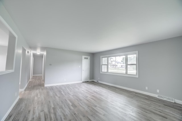 1978 Fleming St, Watseka, IL 60970 - empty room featuring wood finished floors and baseboards
