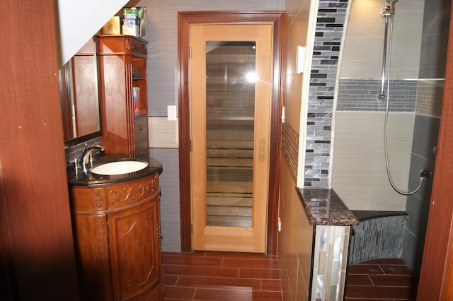 bathroom featuring wood finish floors and vanity