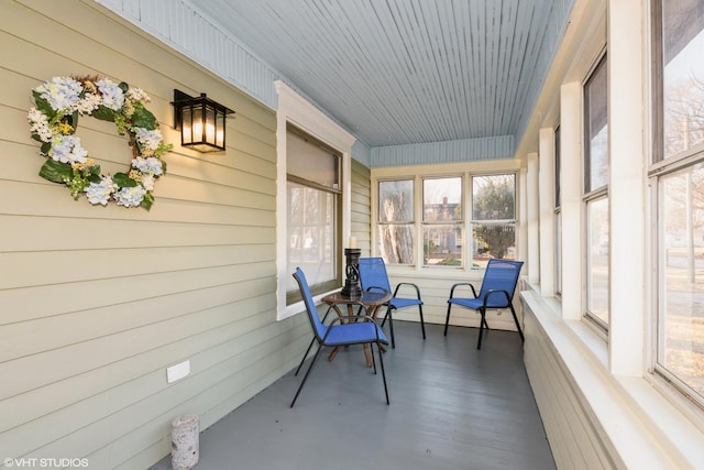 sunroom / solarium featuring plenty of natural light