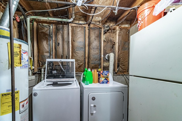 laundry room featuring independent washer and dryer, laundry area, and gas water heater