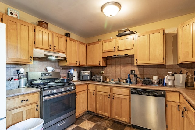 kitchen with backsplash, stainless steel appliances, under cabinet range hood, light brown cabinets, and a sink