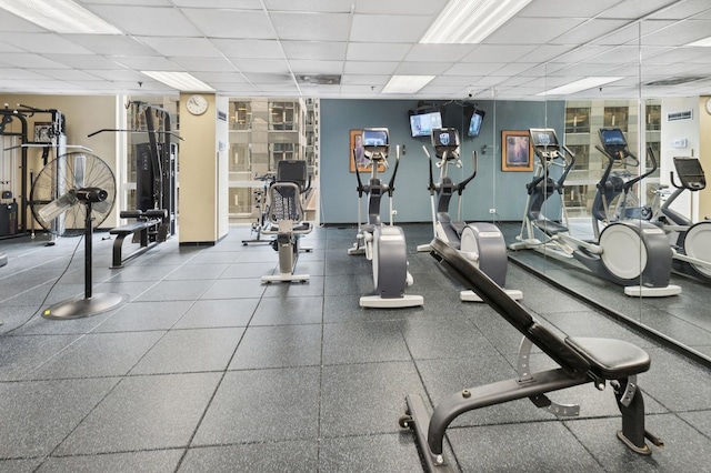 workout area with a drop ceiling