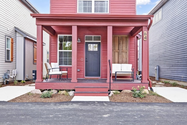 property entrance featuring covered porch