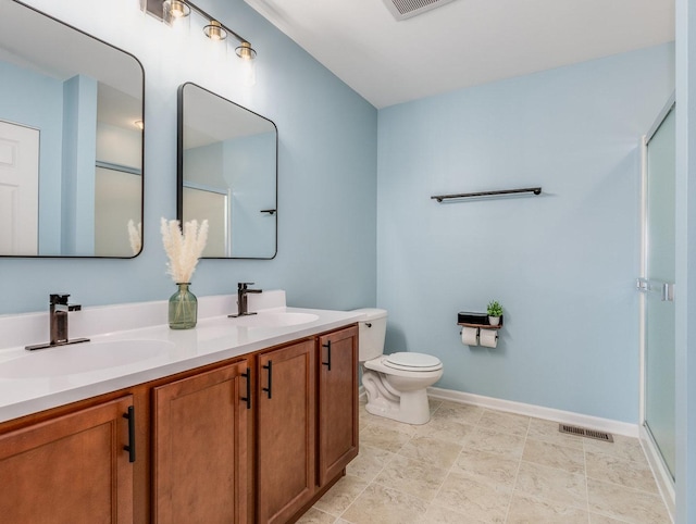 full bathroom featuring visible vents, a sink, toilet, and double vanity