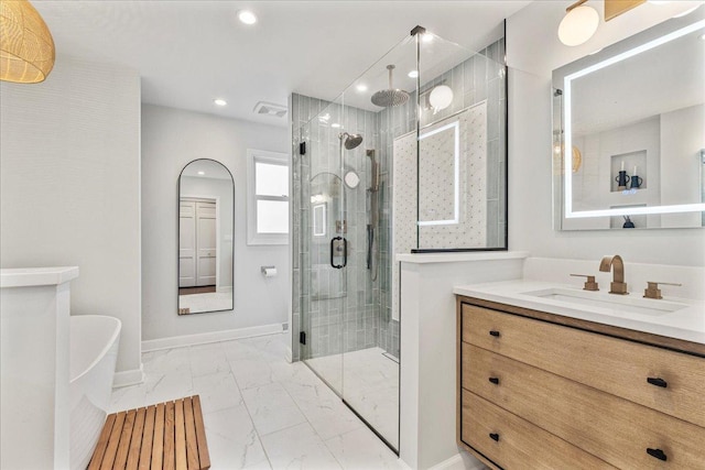 bathroom with a shower stall, baseboards, recessed lighting, marble finish floor, and vanity