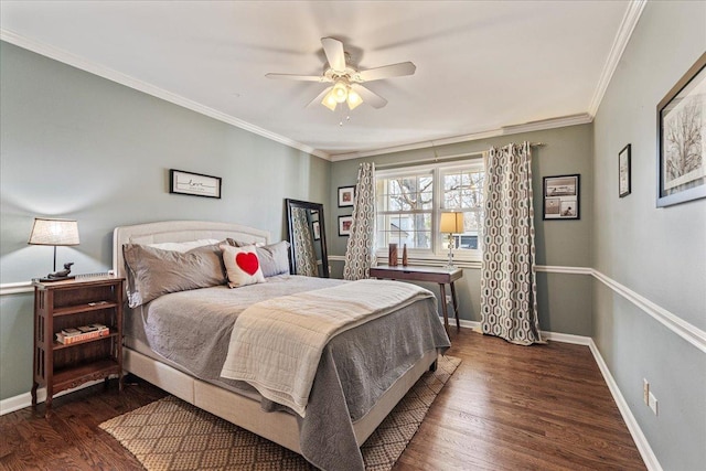 bedroom with wood finished floors, baseboards, and ornamental molding