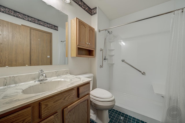 full bathroom featuring curtained shower, tile patterned flooring, vanity, and toilet