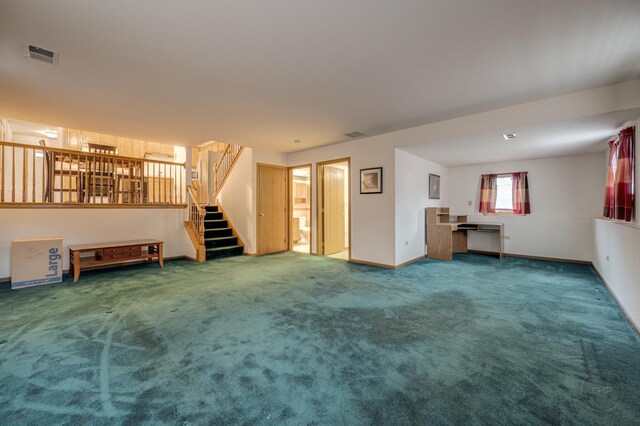 interior space featuring stairs, carpet flooring, visible vents, and baseboards