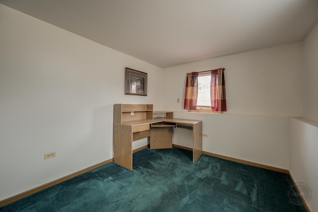 office area with carpet flooring, built in study area, and baseboards